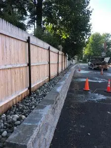 a retaining wall built by a professional hardscaping company