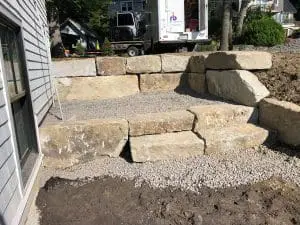 stone retaining wall installed by a professional hardscaping company