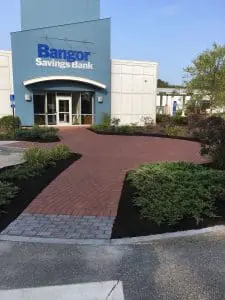 professional landscaping services showcased outside of a Bangor savings bank in southern Maine