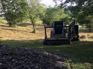 A grader performing ground work
